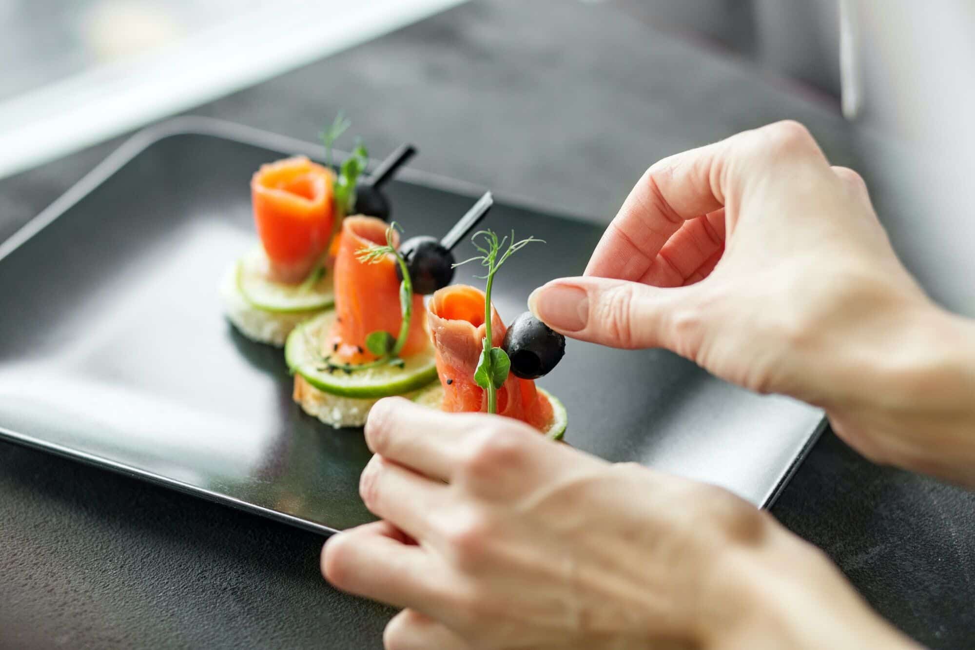 Delicious appetizers with red fish and lime. Concept of food, restaurant, catering, menu.