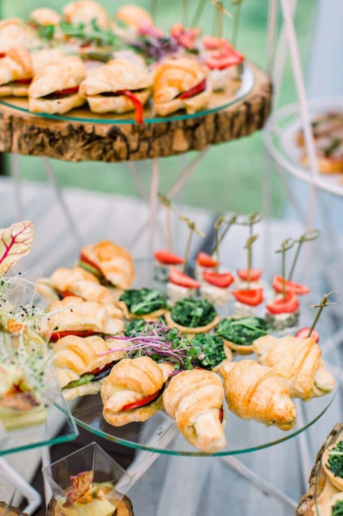 Catering buffet and rustic decor, outdoor wedding party with healthy food snacks