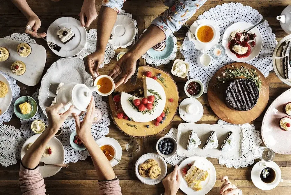 Elegant afternoon tea spread with cakes, pastries and coffee served by Pearl Lemon Catering coffee cart services Barcelona