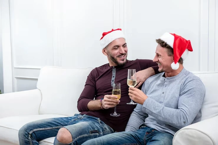 Office colleagues enjoying drinks during a professionally organised Christmas party