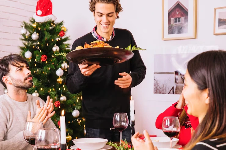 Trusted Christmas buffet catering table filled with warm festive dishes prepared for seasonal gatherings