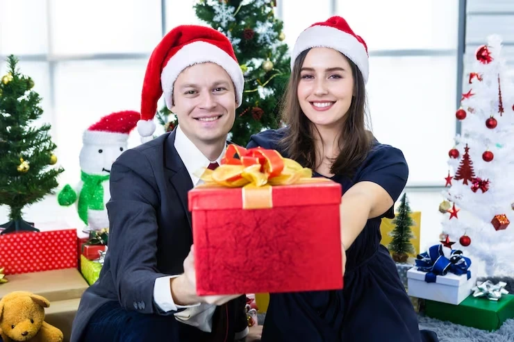 Office Christmas catering team presenting a festive package for a Nottingham workplace event