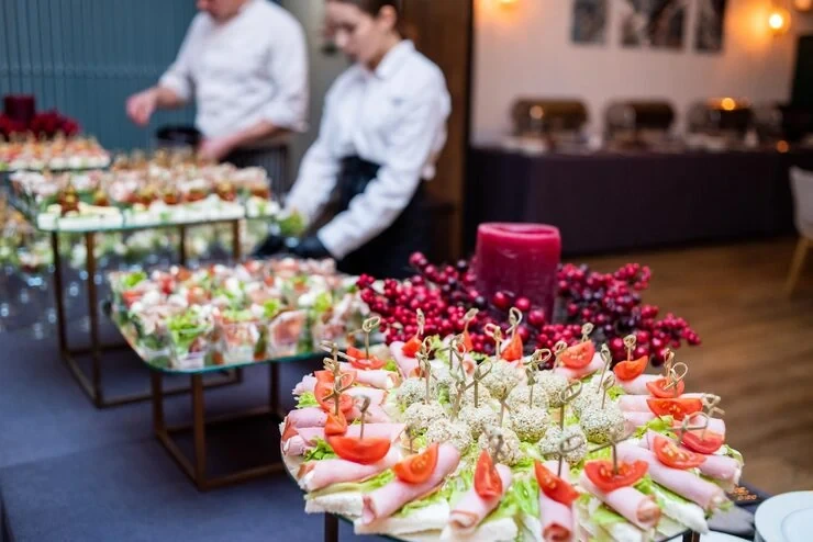 Corporate box and private suite catering service in London with luxury food presentation inside a VIP hospitality suite