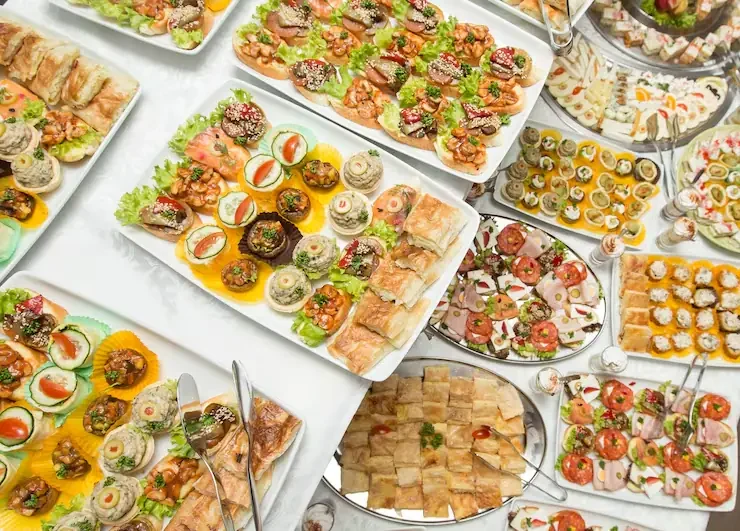 Office catering services in Barcelona for corporate events with professionally presented food in a business setting