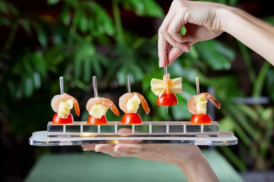 Premium canapé catering services for Birmingham events with beautifully presented bite-sized gourmet dishes
