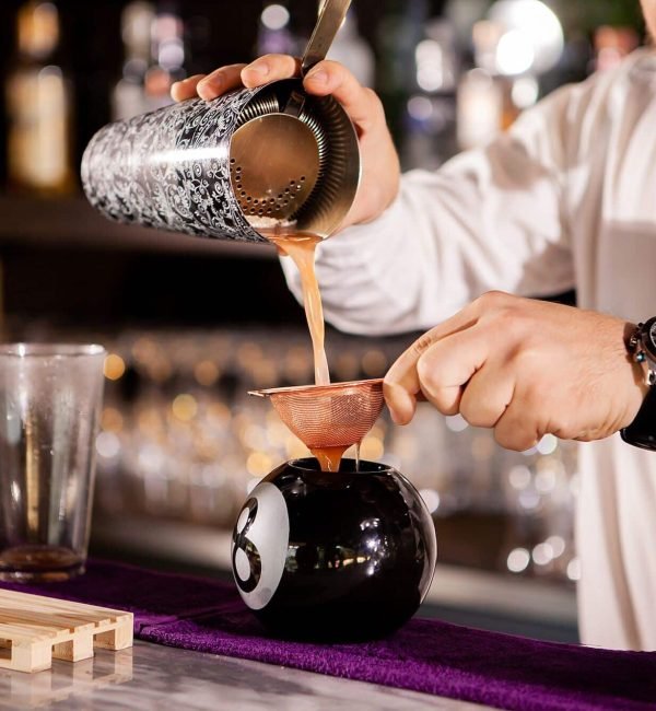 Bartender bartender is pouring a drink, local bartenders for hire in London