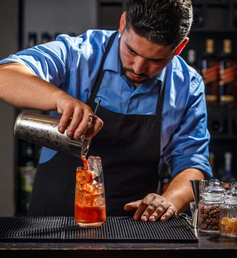 Bartender makes a cocktail