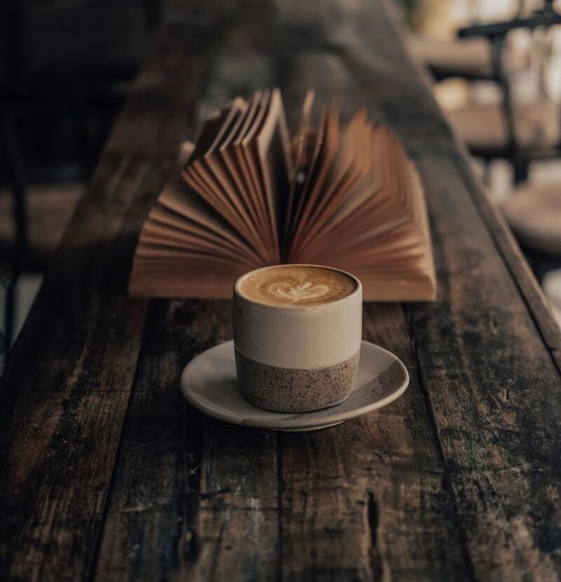 cup of coffee and book cup of coffee and book