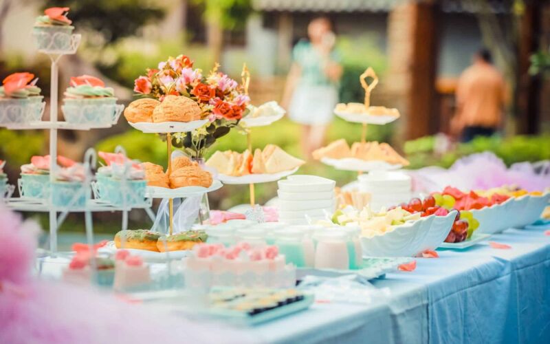 Various Desserts on a Table covered with Baby Blue Cover