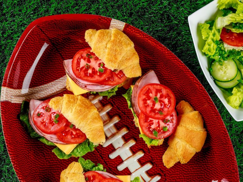 Plate with sandwiches and salad for celebration american football. Sports Event Catering In London, Social Event Catering in London